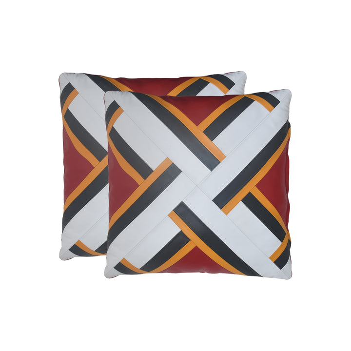 Two decorative pillows with geometric pattern on a white background