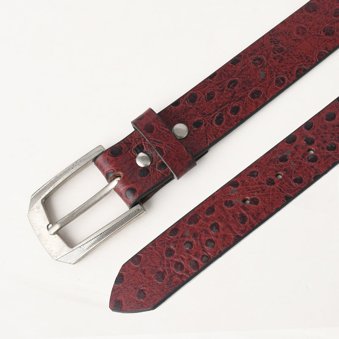 Red leather belt with a silver buckle on a white background