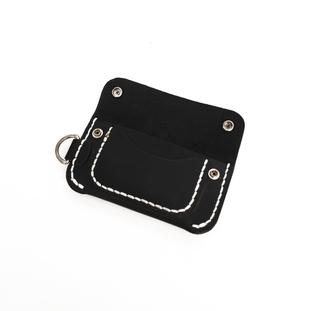 Black leather pouch with white stitching on a white background
