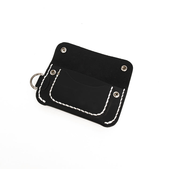 Black leather pouch with white stitching on a white background