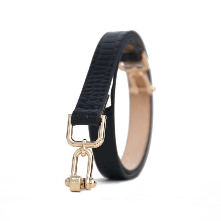 Black leather bracelet with a gold clasp on a white background