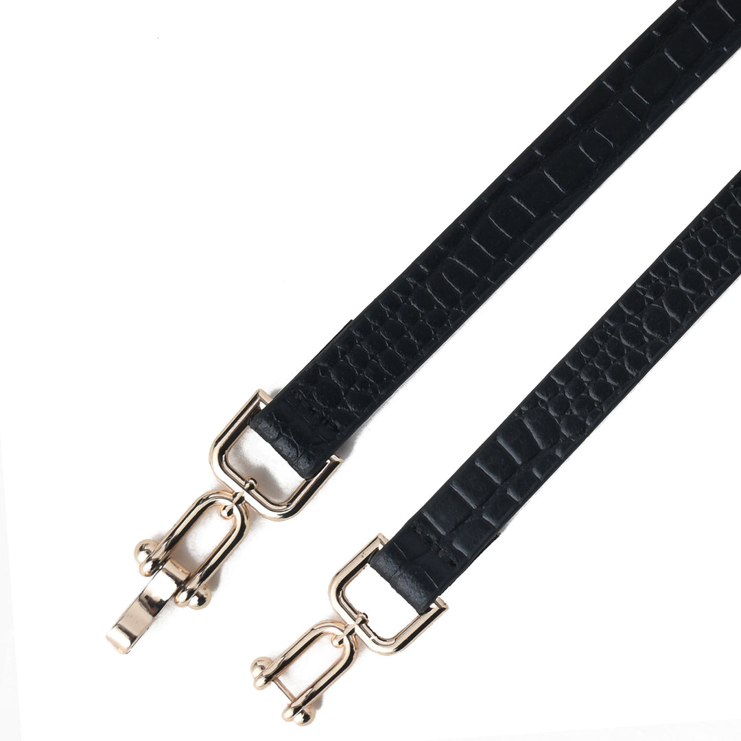 Black leather strap with gold hardware on a white background