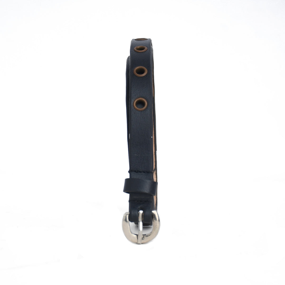 Black leather dog collar with metal buckle on a white background