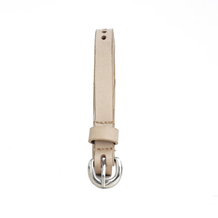 Beige leather watch strap with silver buckle on a white background