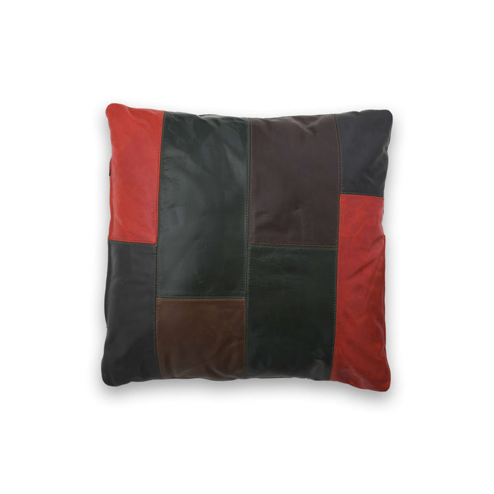 Patchwork pillow with red, black, and brown sections on a white background
