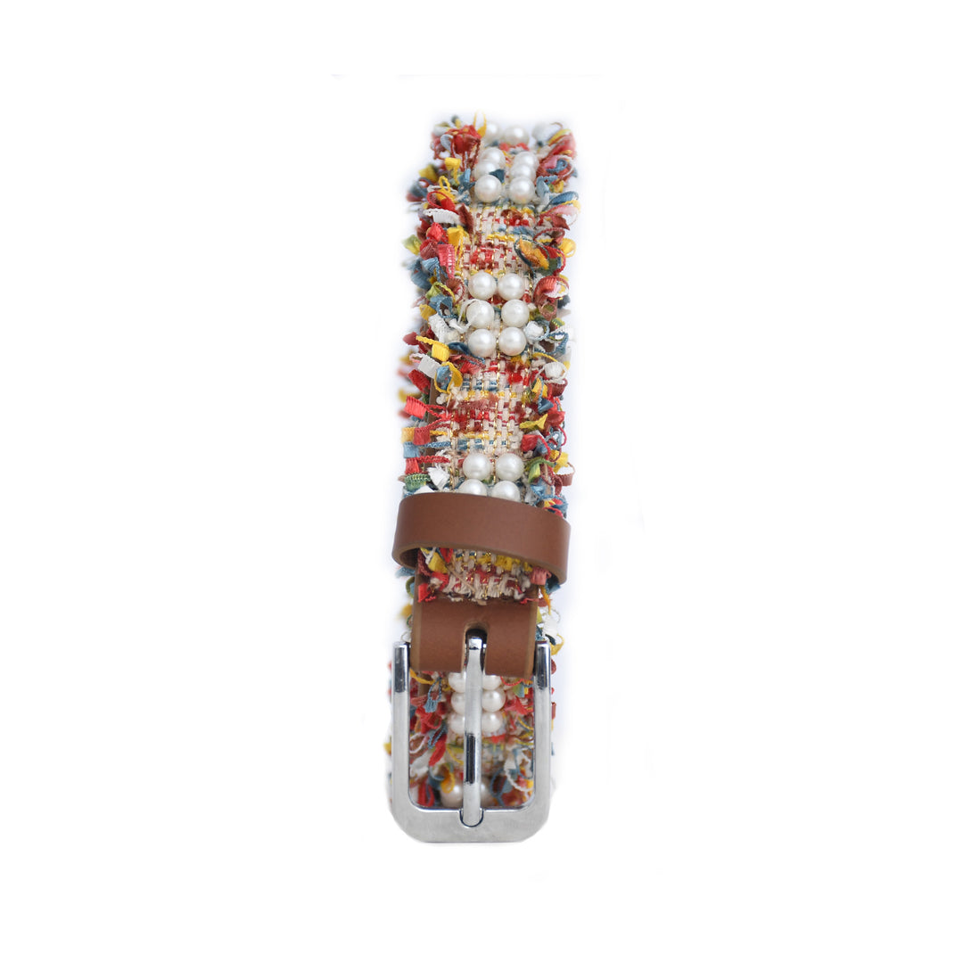 Multicolored beaded belt with a brown leather strap on a white background