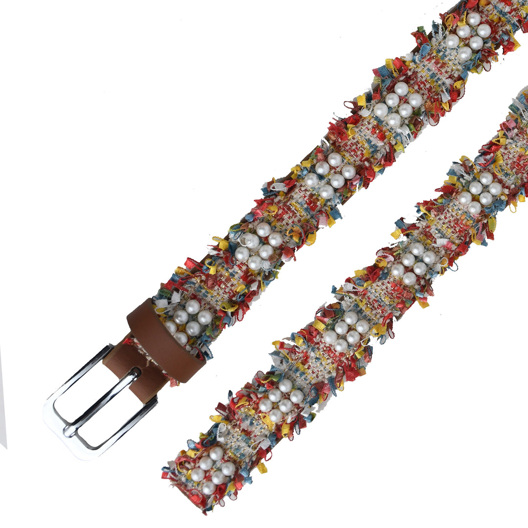 Colorful belt with floral pattern and pearl-like stones on a white background