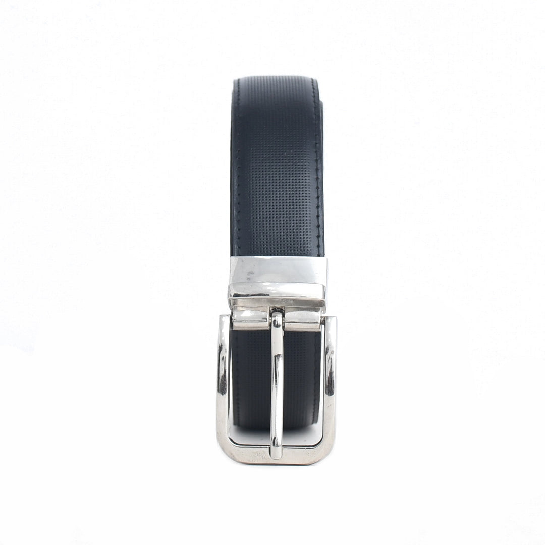 Black leather belt with silver buckle on a white background