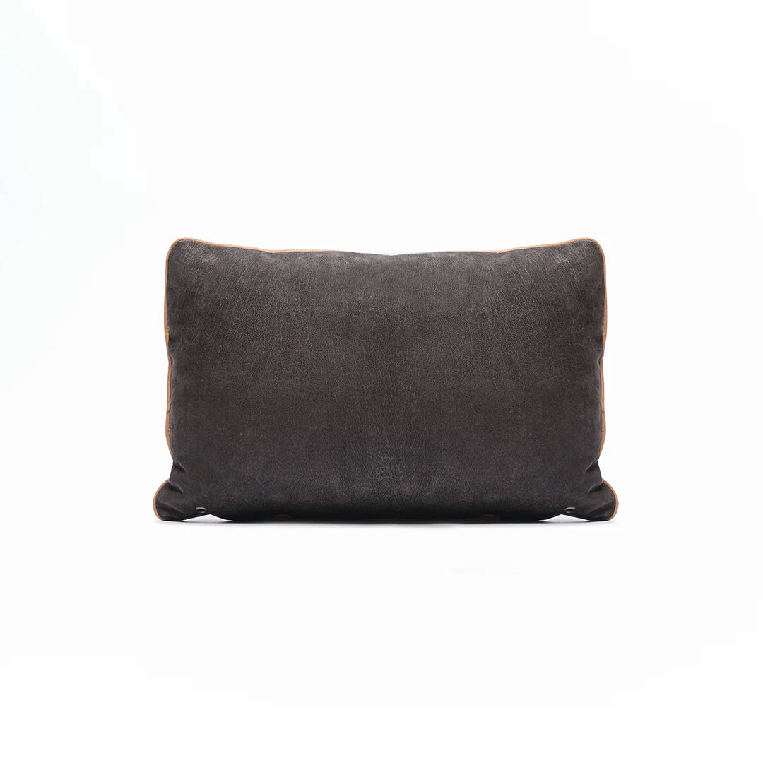 Dark gray pillow on a white background