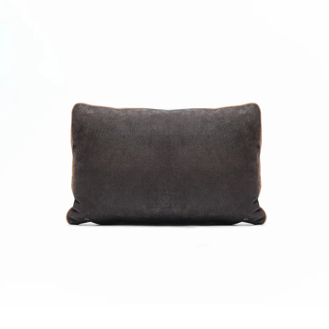 Dark gray pillow on a white background