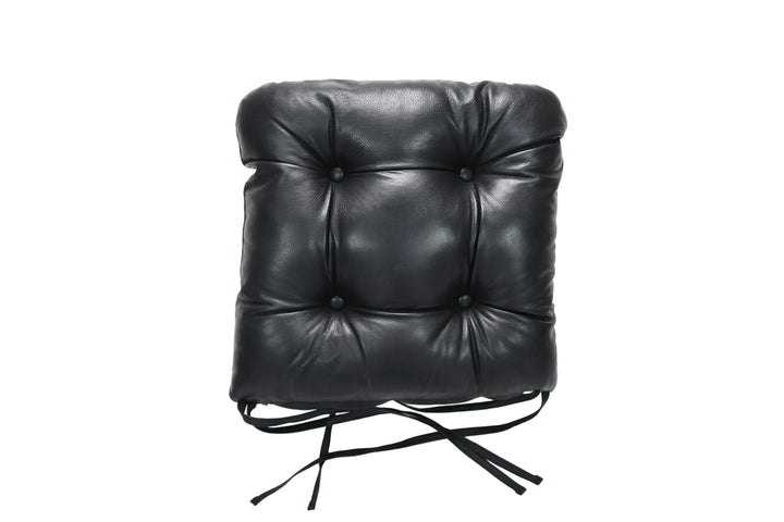 Black leather chair cushion on a white background