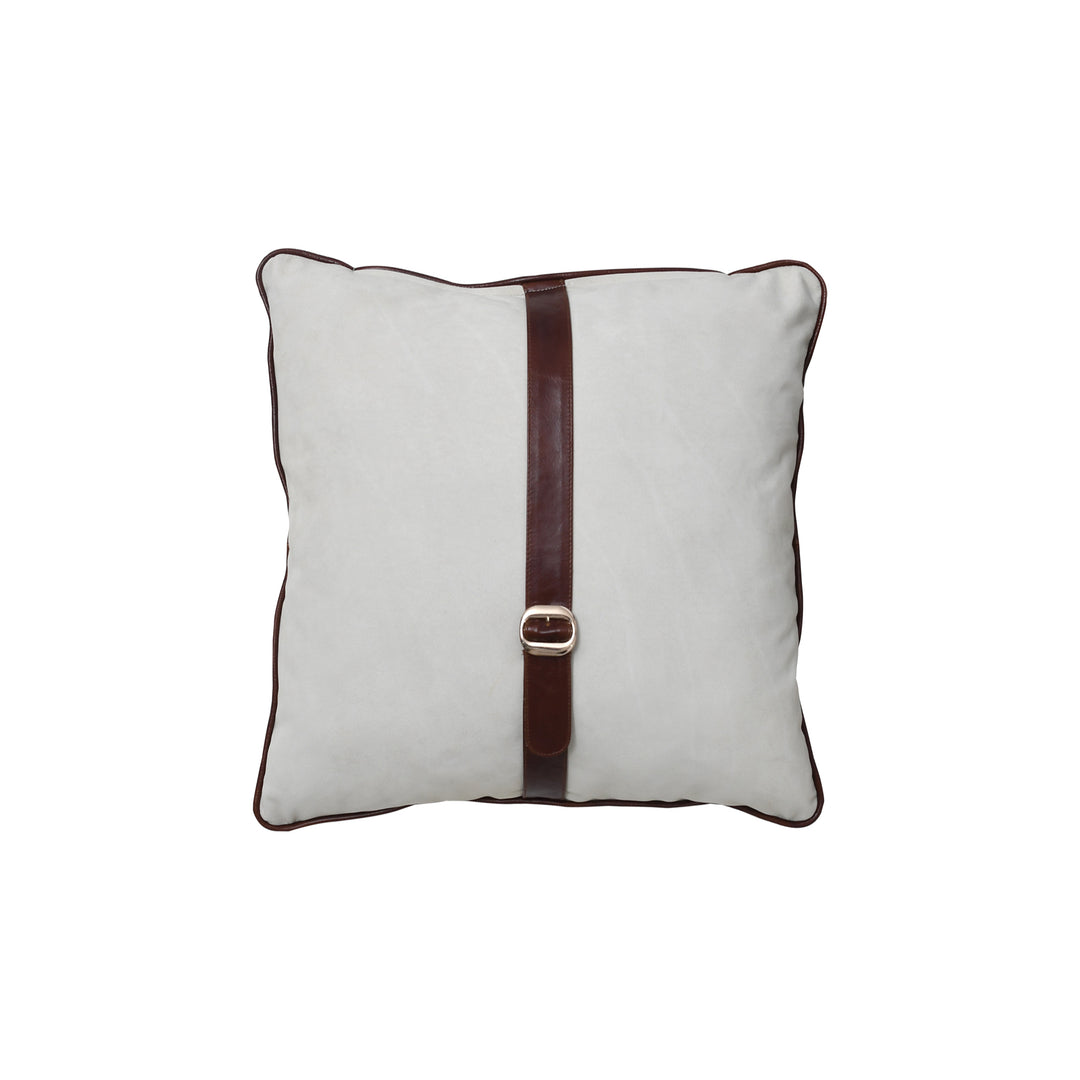 Decorative pillow with a brown leather strap and buckle on a white background