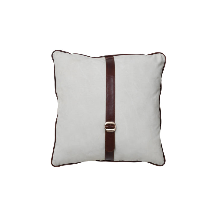 Decorative pillow with a brown leather strap and buckle on a white background