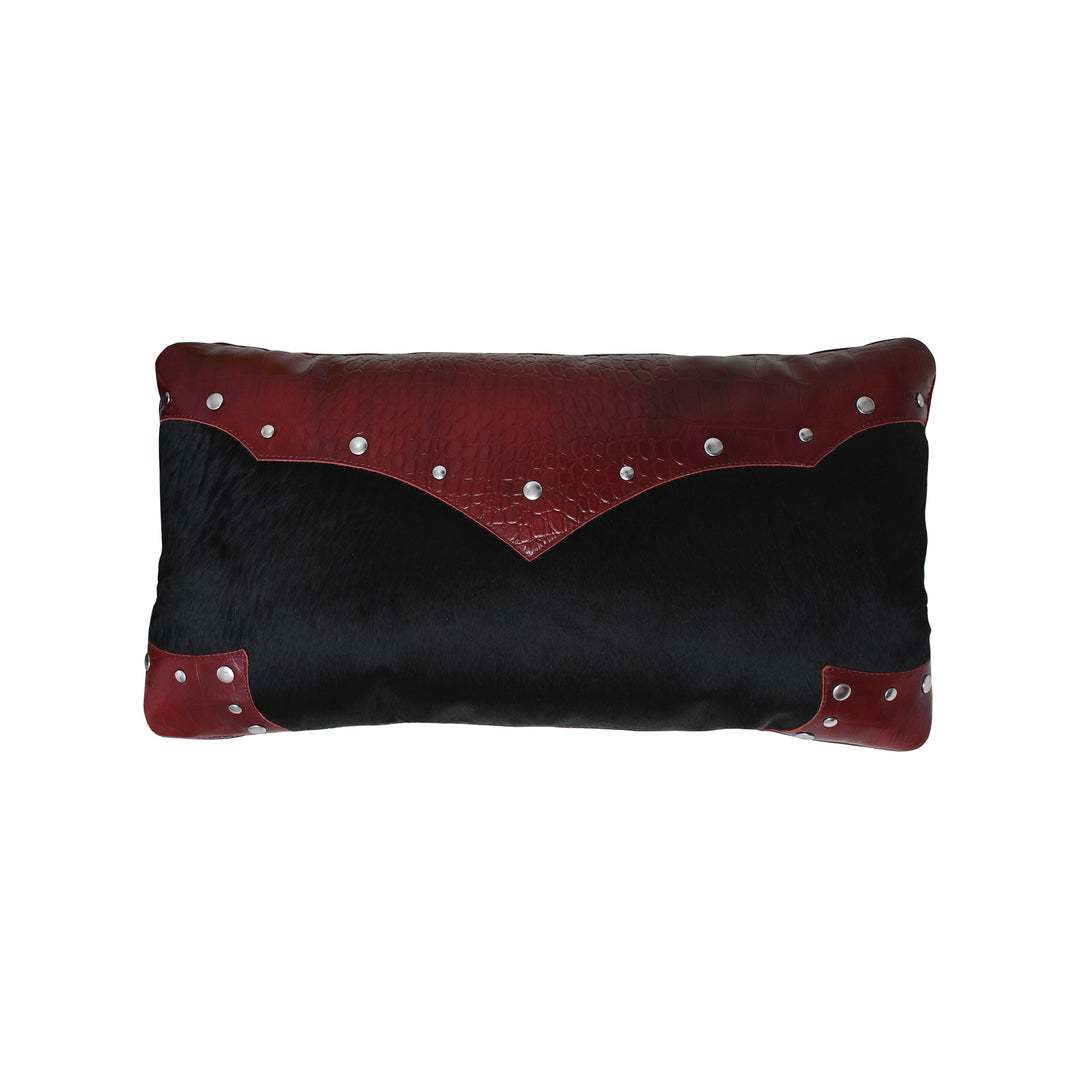 Black and red cushion with studded details on a white background