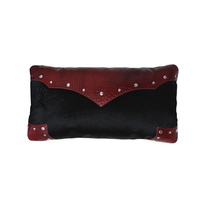 Black and red cushion with studded details on a white background
