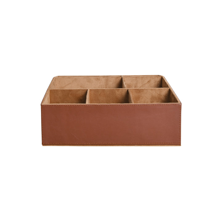 Brown leather organizer with multiple compartments on a white background
