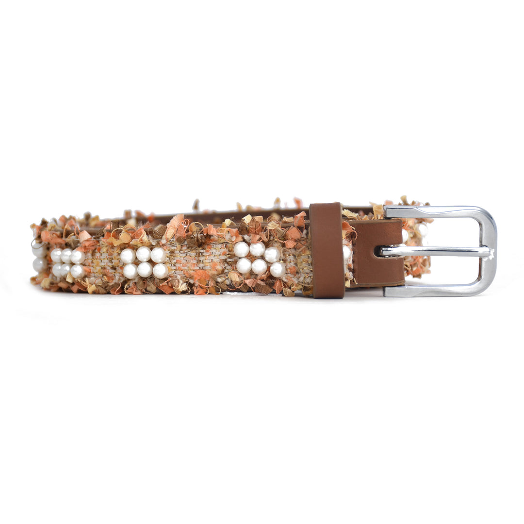 Belt with decorative elements on a white background