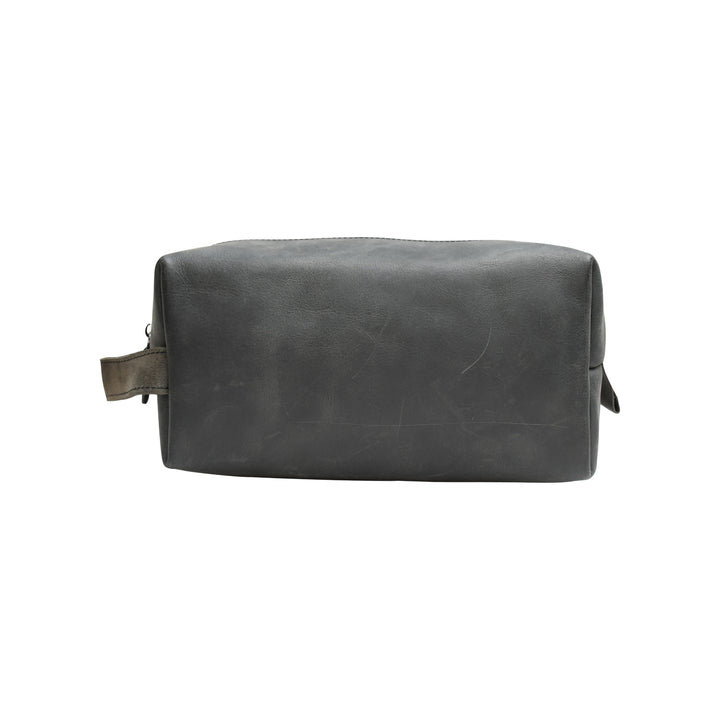 Gray leather toiletry bag on a white background