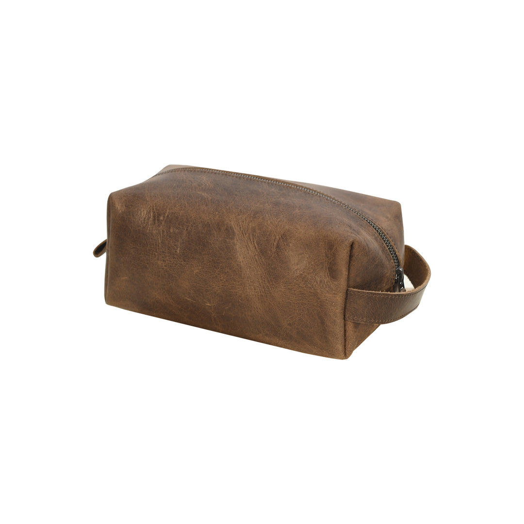 Brown leather toiletry bag on a white background