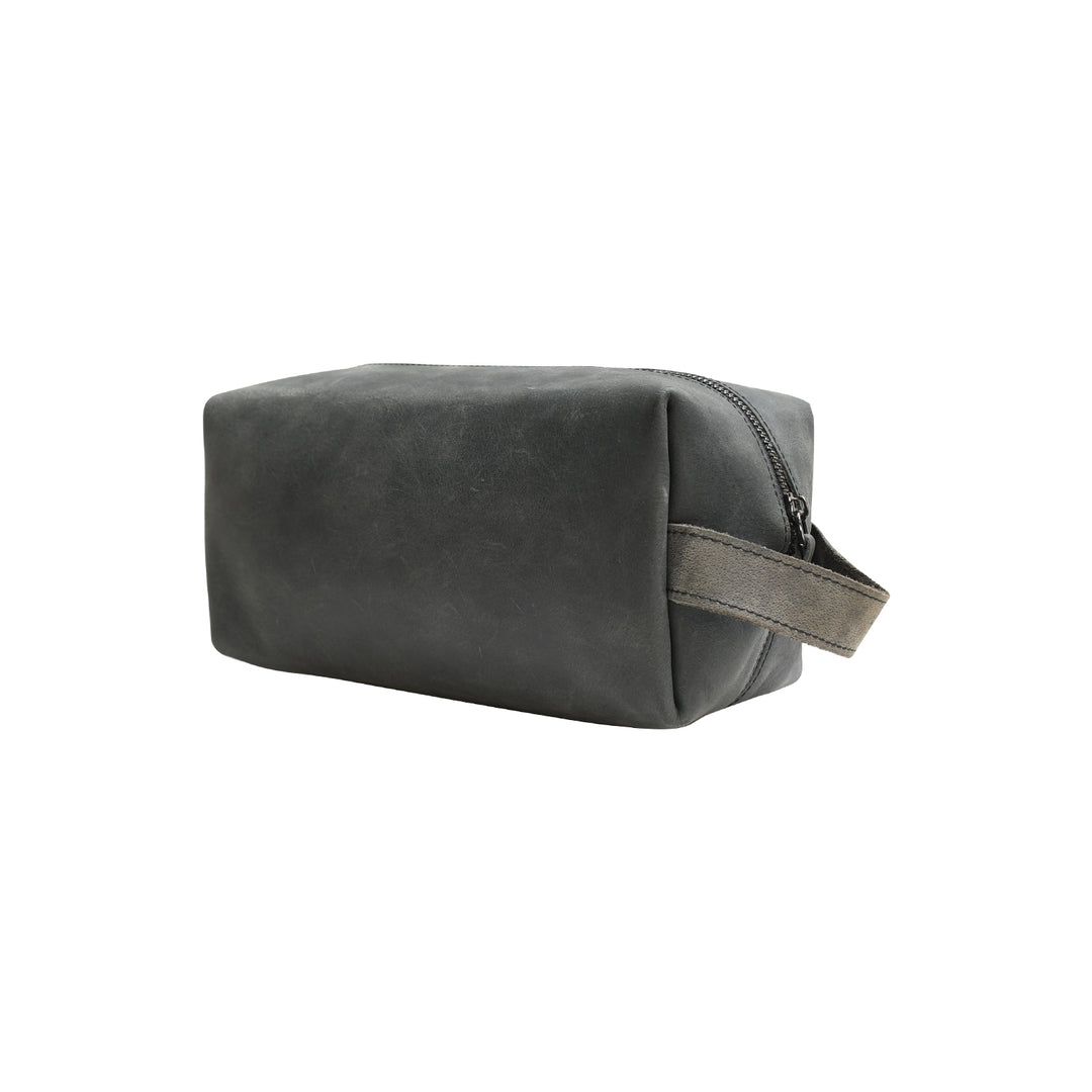 Gray leather toiletry bag with zipper on a white background