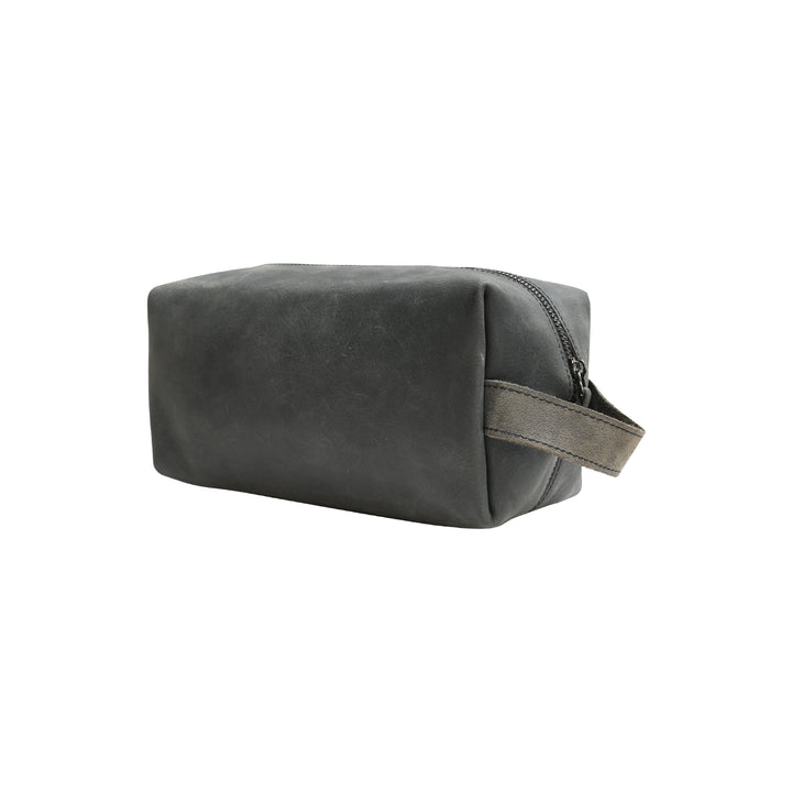Gray leather toiletry bag with zipper on a white background