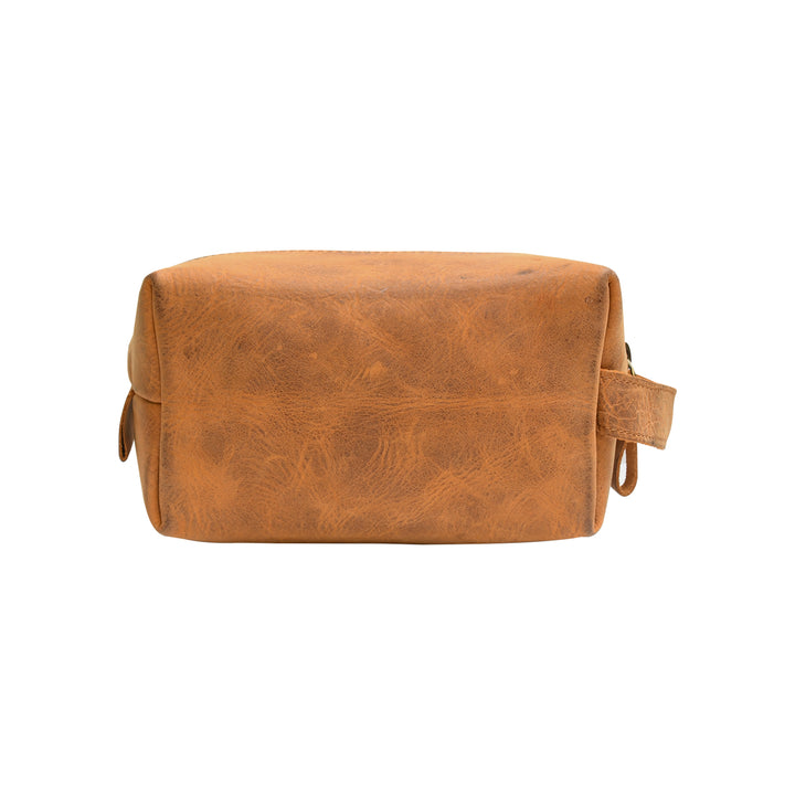 Brown leather toiletry bag on a white background