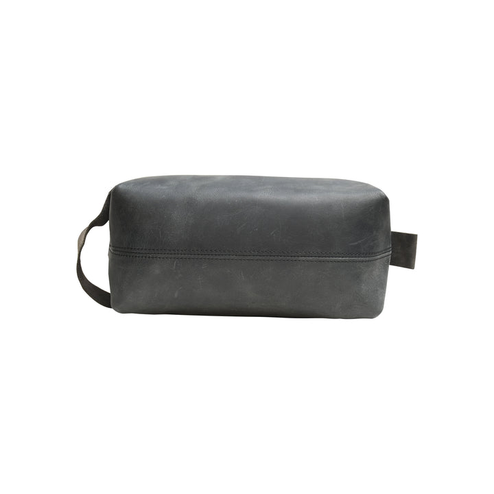 Black leather toiletry bag on a white background