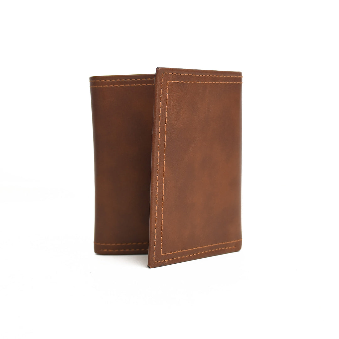 Brown leather wallet on a white background