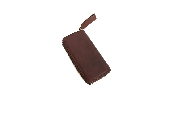 Brown leather wallet on a white background