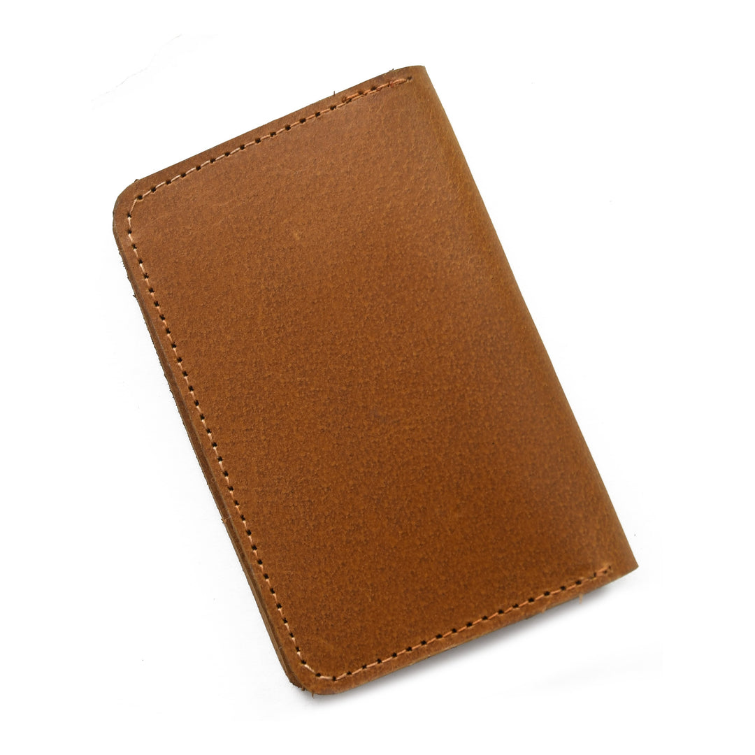 Brown leather wallet on a white background