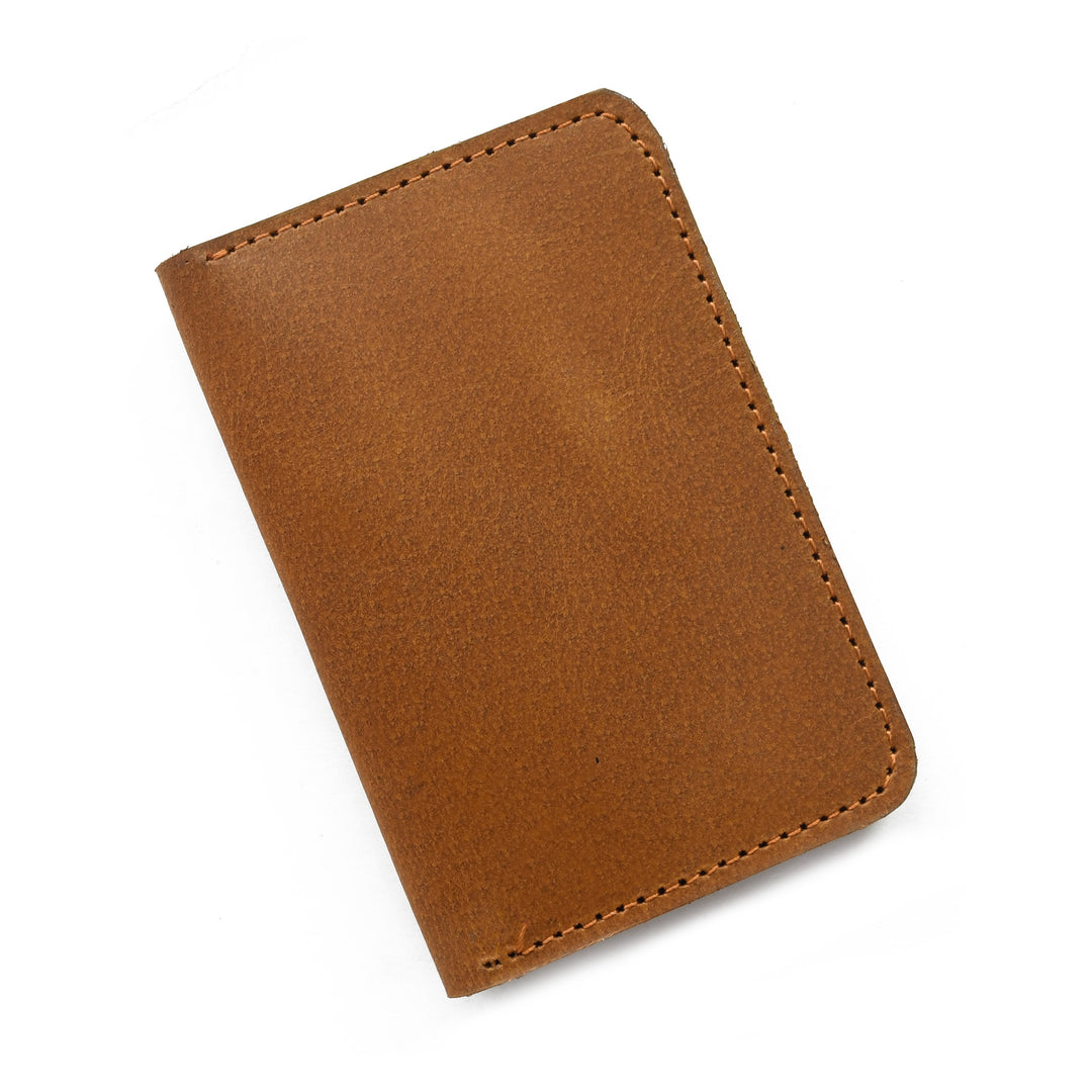 Brown leather wallet on a white background