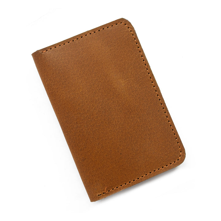 Brown leather wallet on a white background