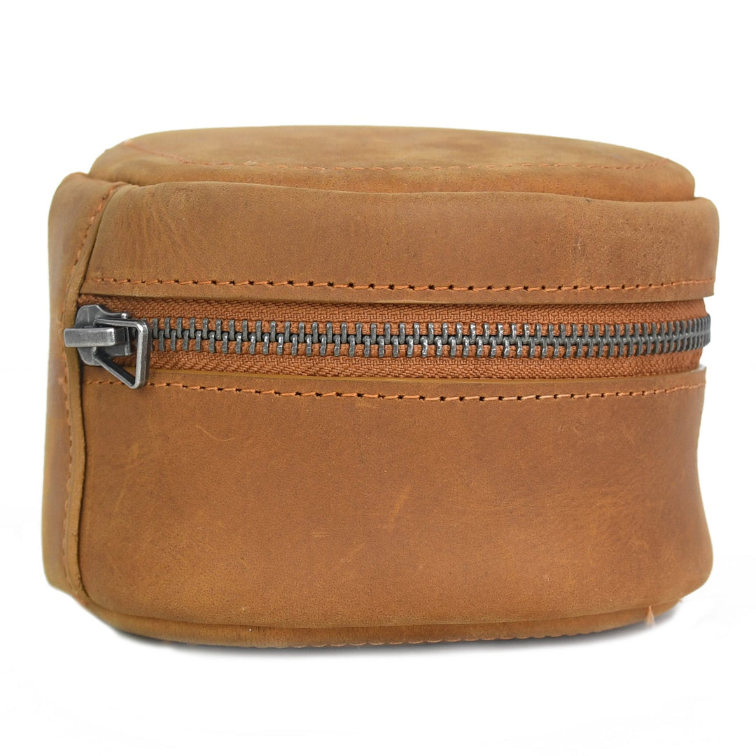 Brown leather pouch with a zipper on a white background