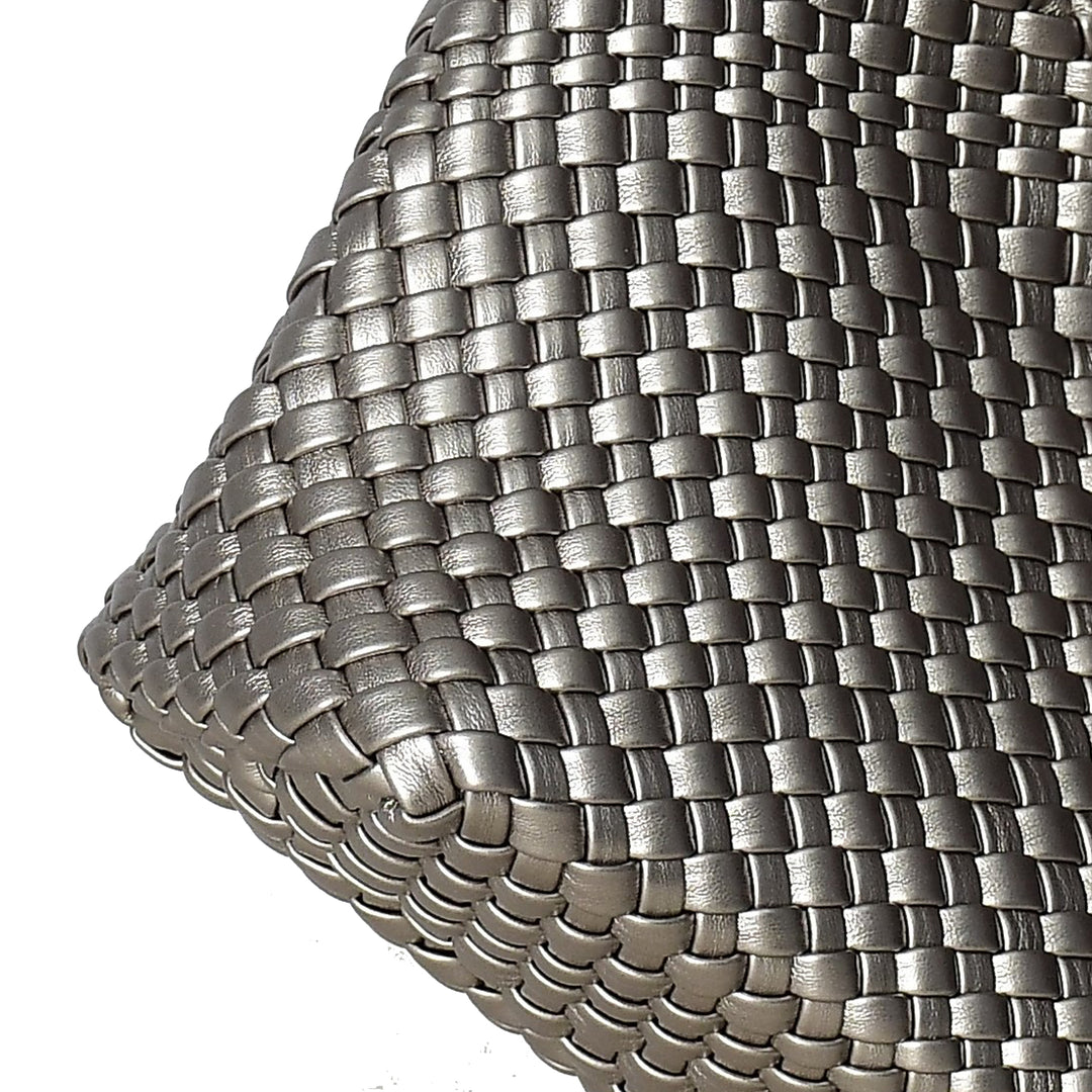Close-up of woven metallic material on a white background