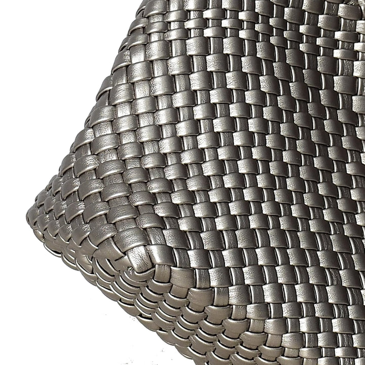 Close-up of woven metallic material on a white background