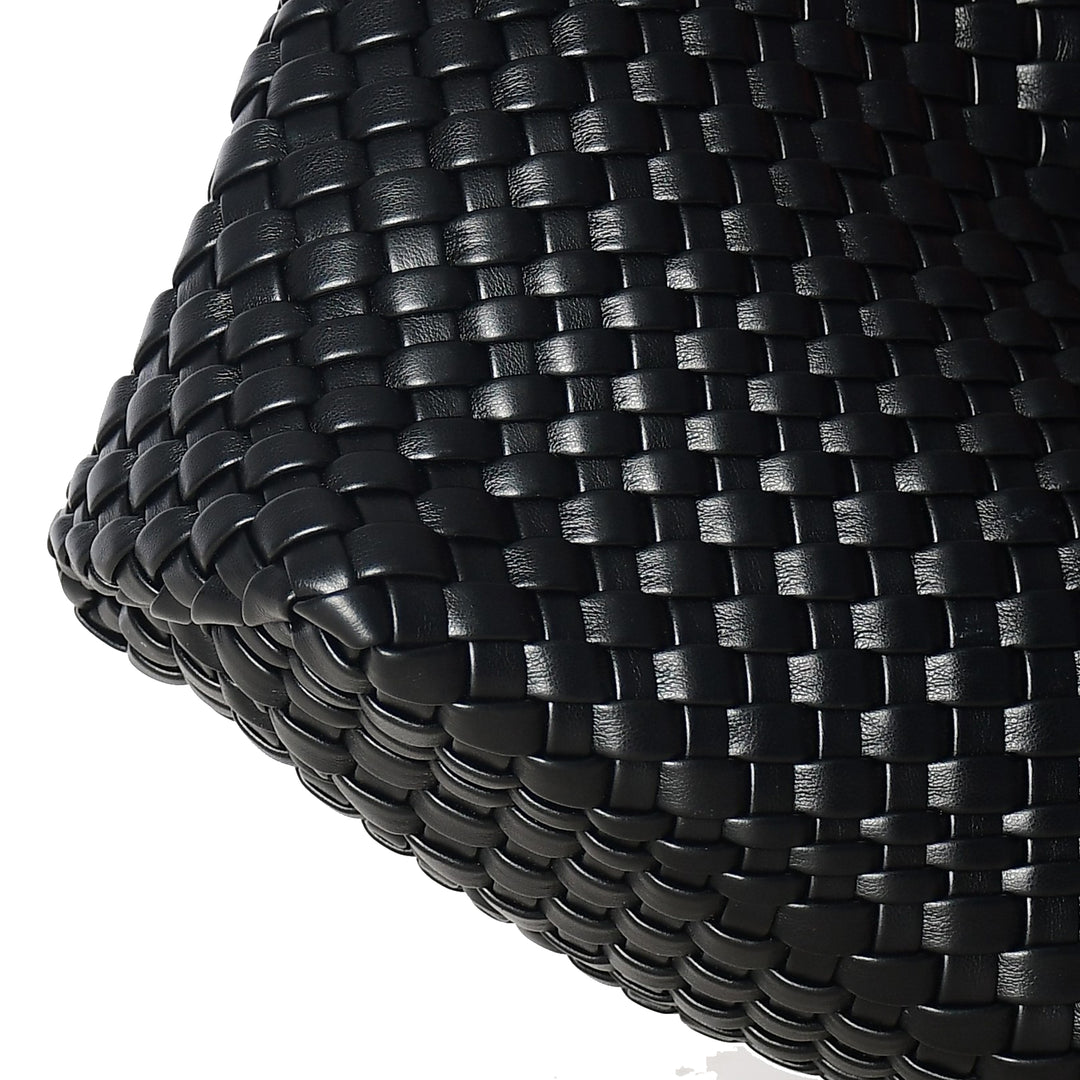 Close-up of a black woven material on a white background