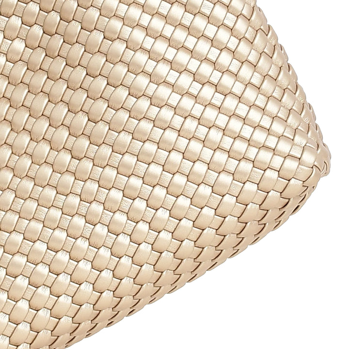 Close-up of a beige woven basket on a white background