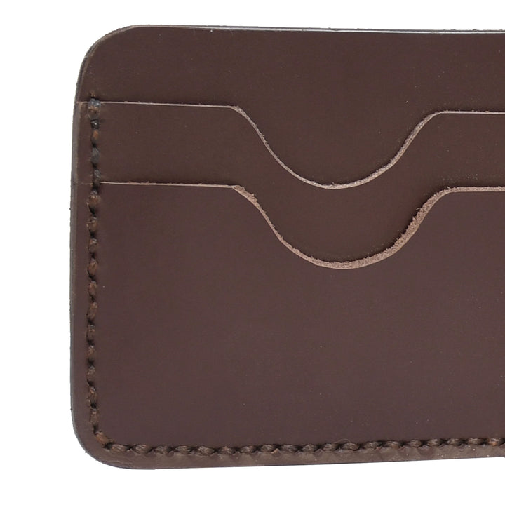 Brown leather wallet on a white background