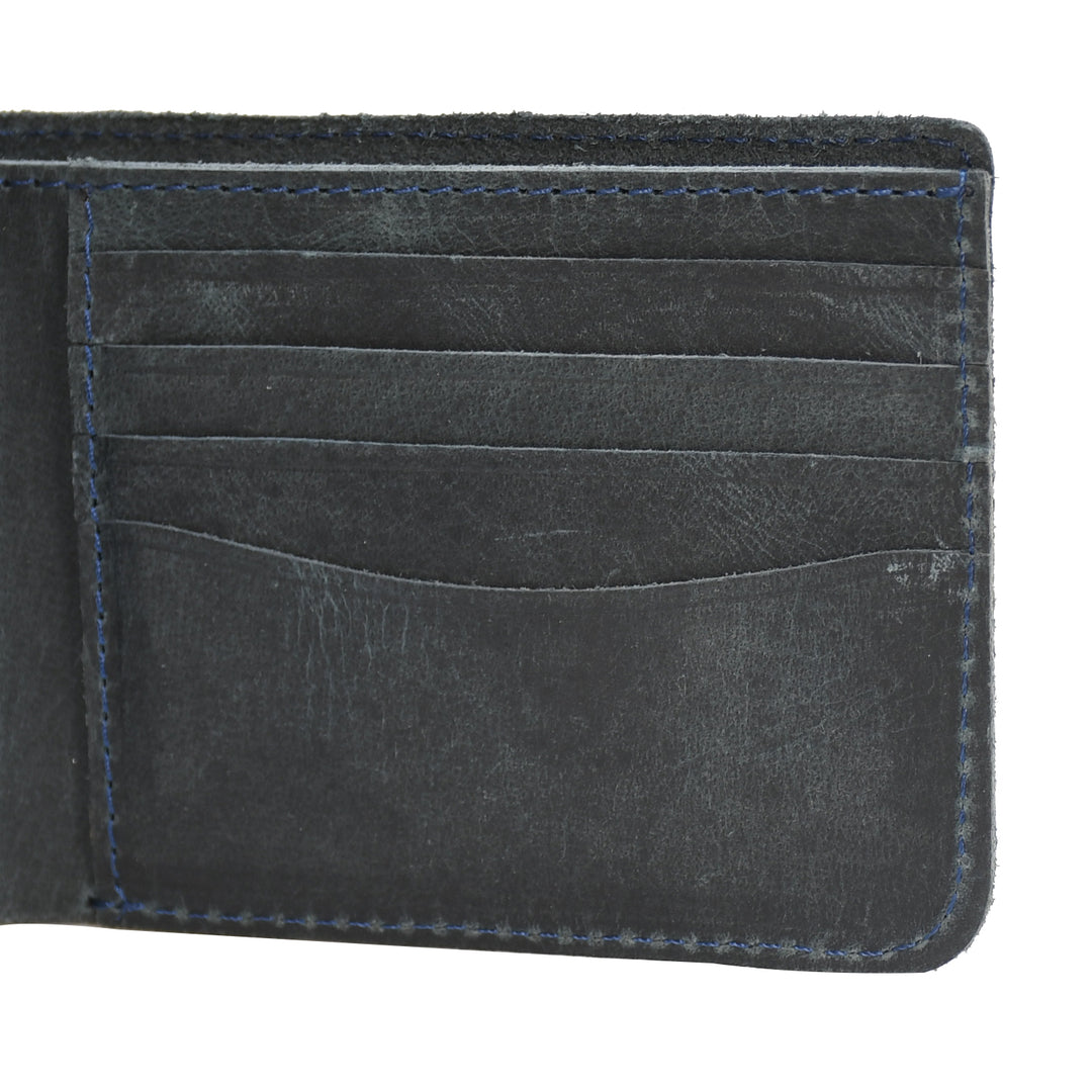 Close-up of a grey leather wallet with card slots on a white background

