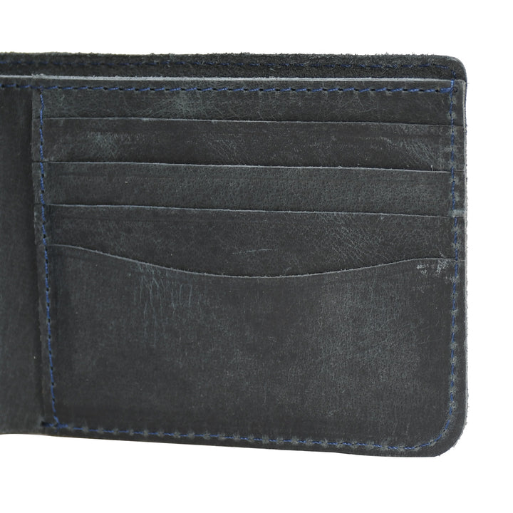 Close-up of a grey leather wallet with card slots on a white background

