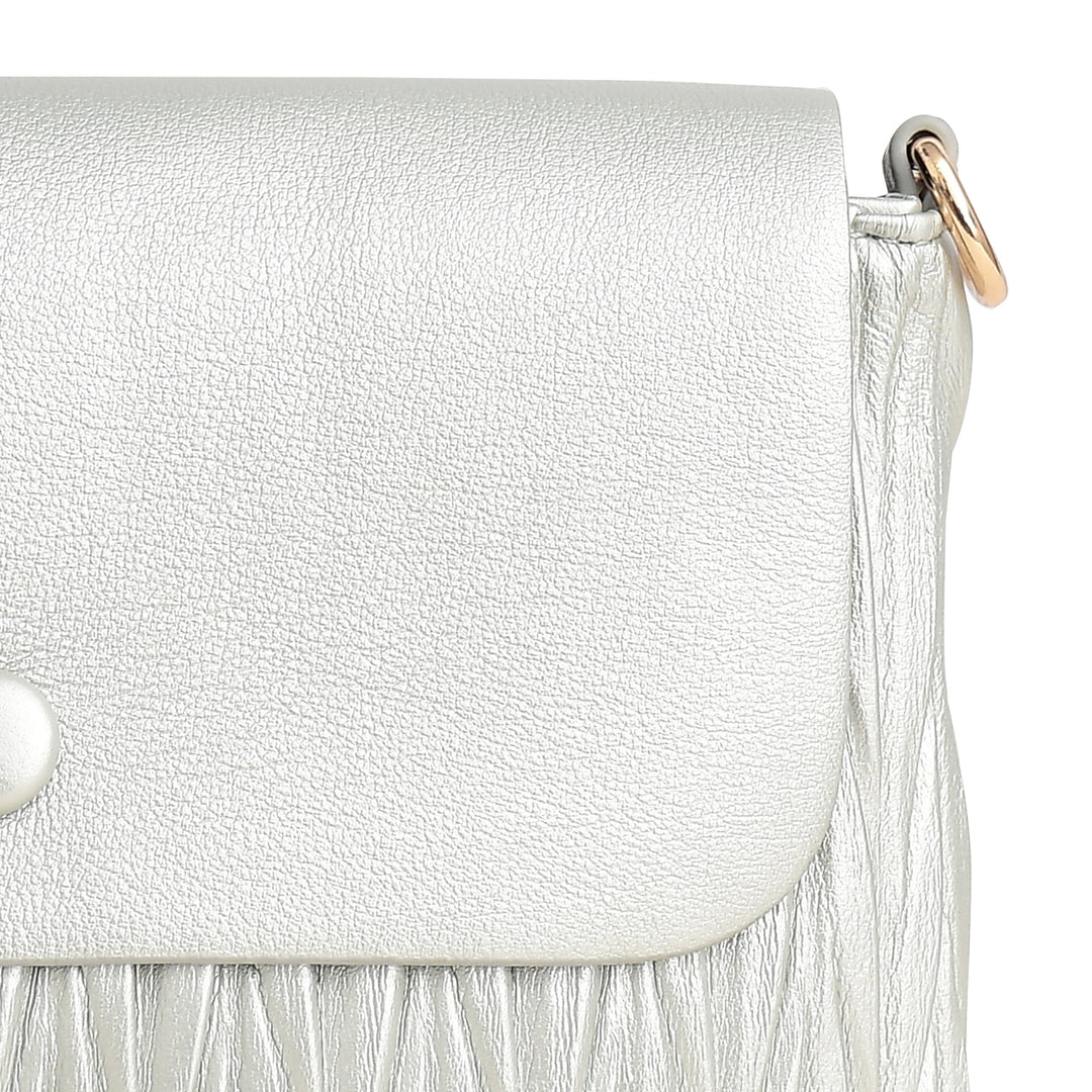 Silver handbag with fringes and a pearl detail on a white background