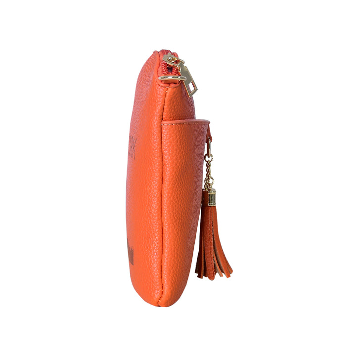 Orange leather clutch with a tassel on a white background