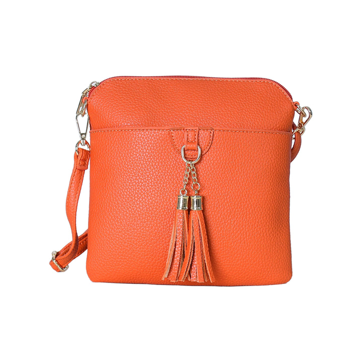 Orange crossbody bag with tassels on a white background