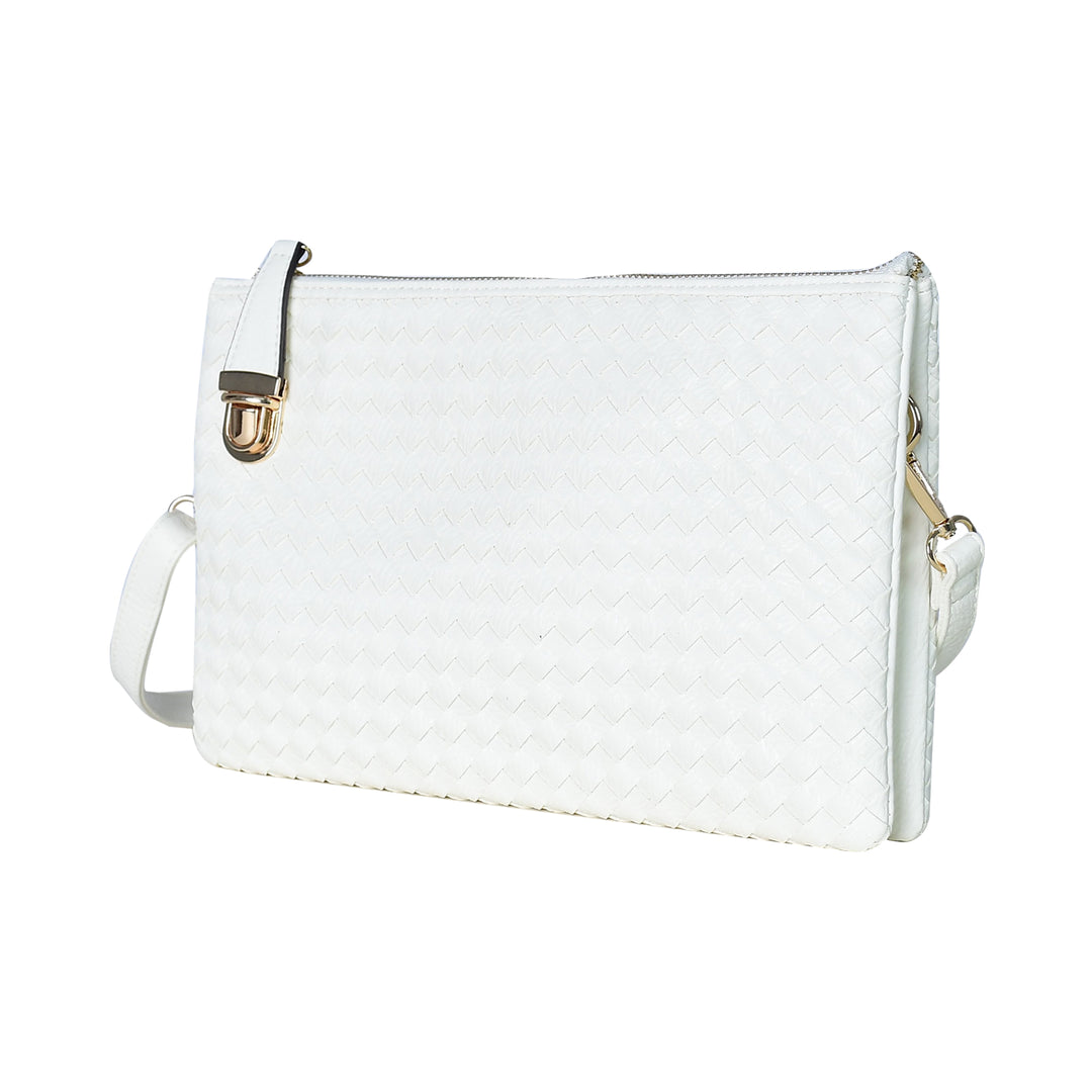 White quilted handbag with a strap on a white background