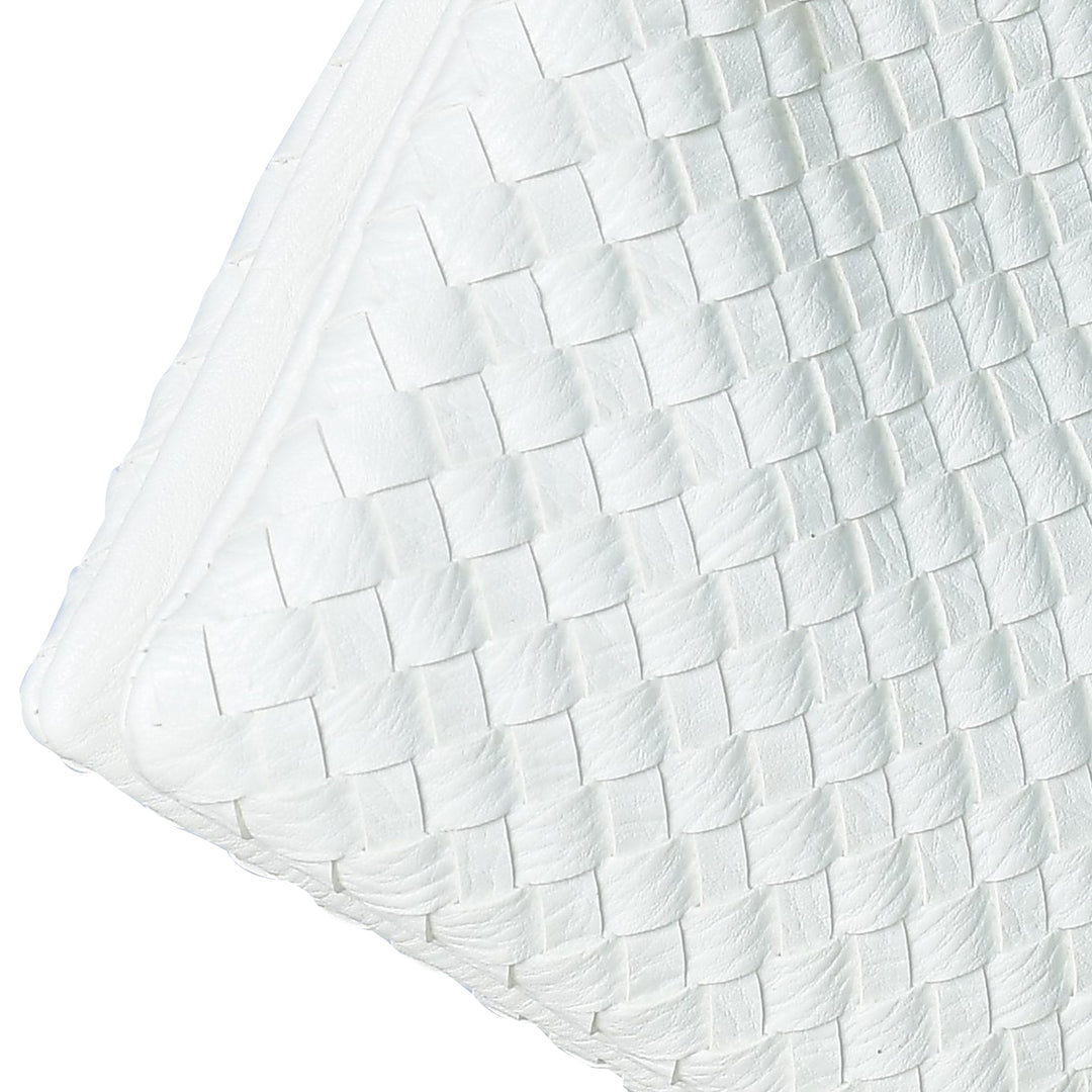 Close-up of a textured white fabric with a basketweave pattern on a white background