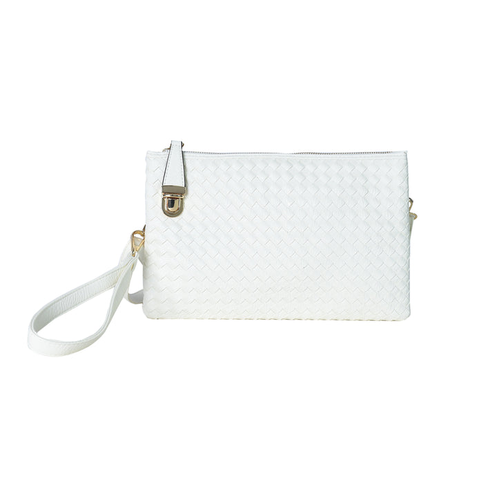 White quilted handbag with a strap on a white background