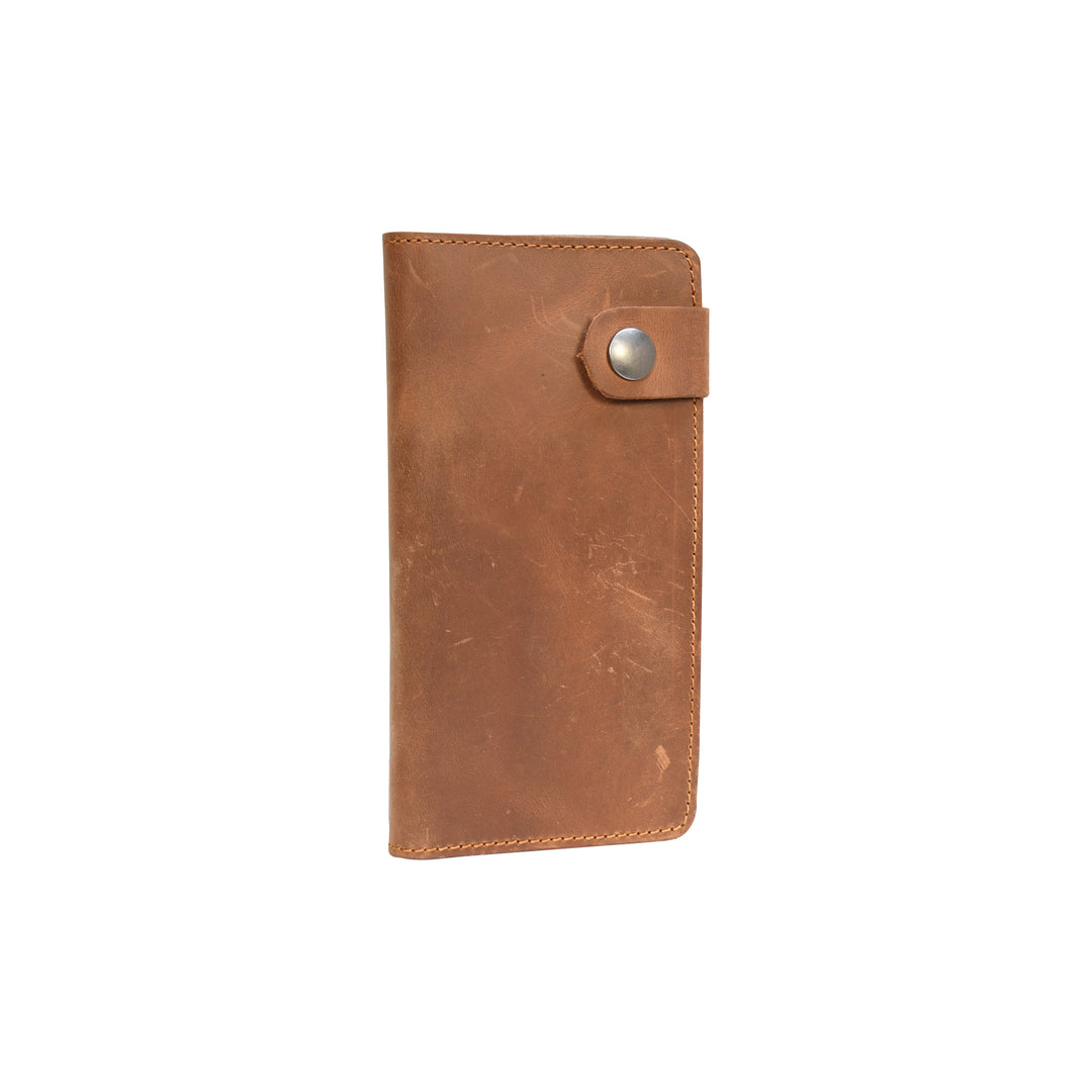 Brown leather phone case with a metallic button on a white background
