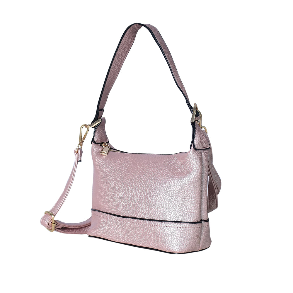 Pink handbag with a strap on a white background