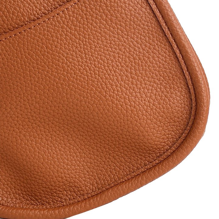 Close-up of a brown leather product on a white background