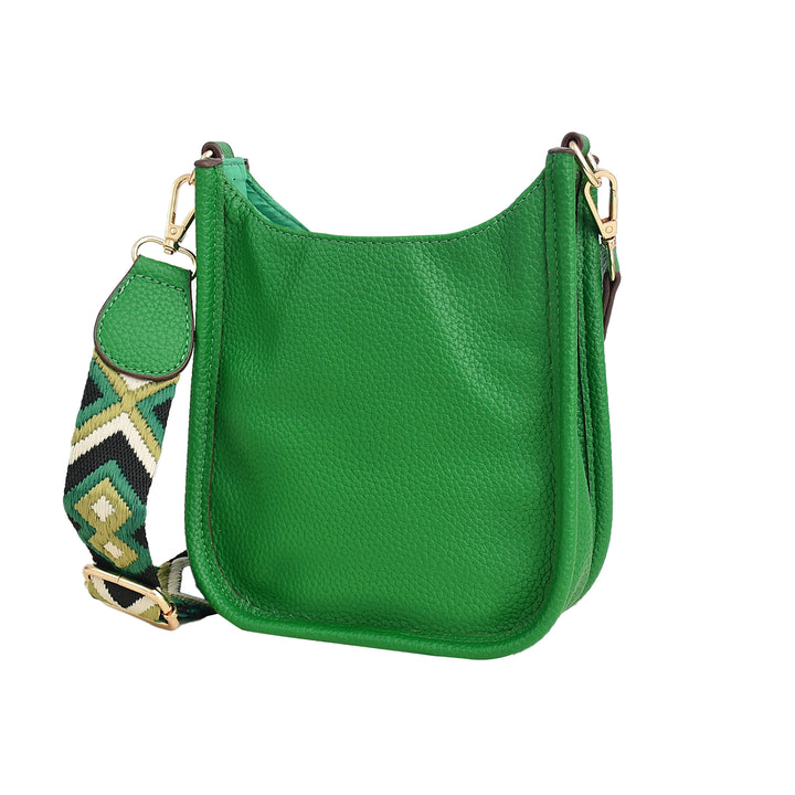 Green leather handbag with a patterned strap on a white background